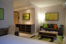 Grand Tropic Suites Hotel