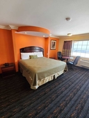 Delmonico Inn & Suites