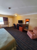 Delmonico Inn & Suites