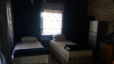 Room in Guest Room - Comfy Room With Dstv and Aircon in Convenient Location