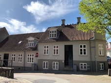 Huset ved springvandet