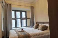 Qidong Warm House Apartment Hotel