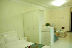 Qidong Warm House Apartment Hotel