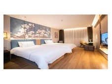 Magnolia Hotel of Xingcheng Central Wenquan Street store)