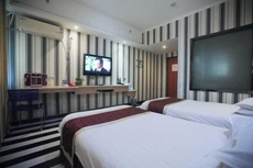 Yining V8 Business Hotel (Teachers University)