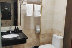 Xuan'en Junhua Business Hotel