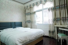 Xuan'en Junhua Business Hotel