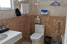 Xuan'en Junhua Business Hotel