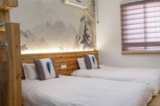 Tiantai Happiness Inn