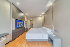 Longxin Business Hotel (Qianlu Store, Longgang Town)